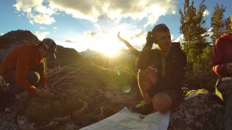 Kyle Miller (left) and Gavin Reed stop for a moment to rest while the group backpacks through Wyoming during the gap semester.
Credit: Lizzie Thomson.