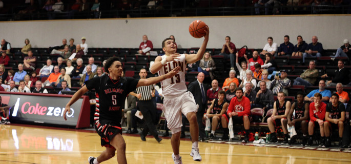 Elon guard Dainan Swoope goes up for a layup in a win over Belmont Abbey. (Andrew Feather/ELN)