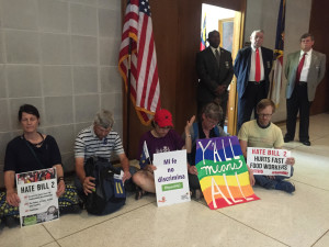 Protestors "sit-in" outside Speaker of the House Tim Moore's office in the North Carolina General Assembly building in Raleigh on Monday, April 25, 2016.