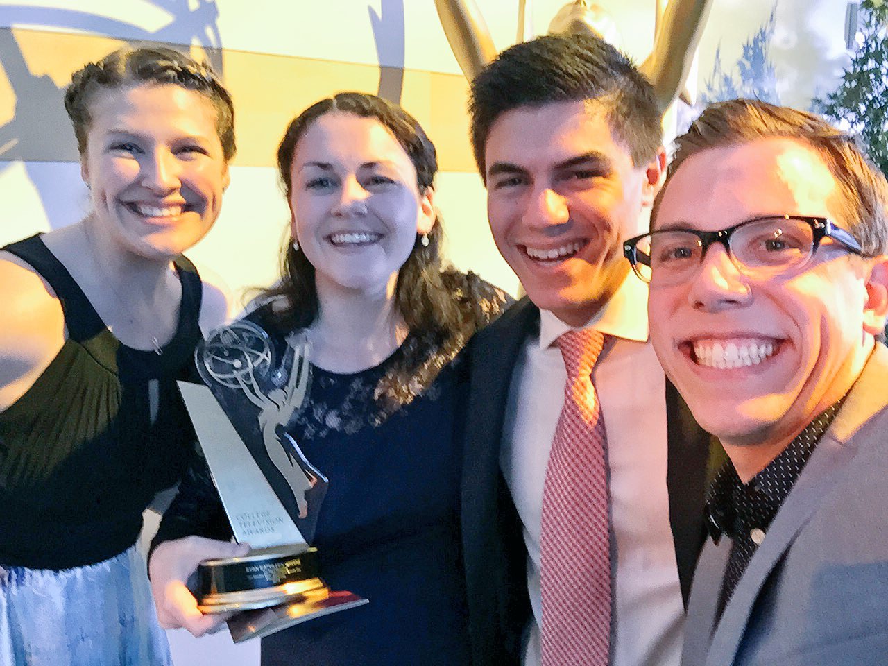 Members of Elon University’s “30 Minutes” news broadcast celebrate the program’s first-place finish in the magazine category of the 37th College Television Awards. Pictured (from left) are Jennie Hook ’16, Ryan Kathleen Greene ’15, Eric Halperin ’15 and Brian Mezerski ’15. Photo courtesy of Mezerski